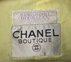 Chanel Boutique tag.