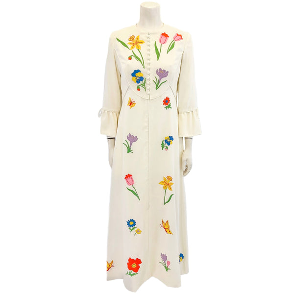 White maxi dress with colorful flower appliques