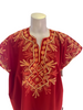 Long, red, short-sleeve, kaftan dress with red, orange, and yellow embroidery. 