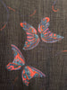 Oversized Black and metallic woven scarf with a print consisting of red and purple butterflies.