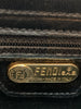 Engraved "Fendi" tag. 