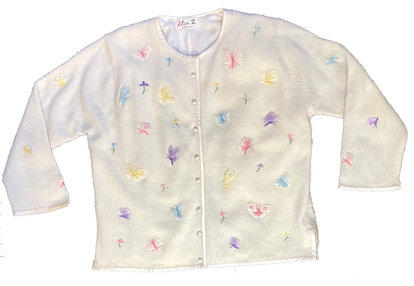Creme knit cardigan with pink, blue, yellow and purple butterfly embroidery