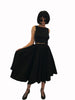 Black, cotton, pleated-waist, full-circle skirt. Mid-calf length. 