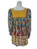 Colorful, tiered, floral mini dress with billowy sleeves. 