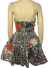 Silver paillette, fit & flare, sleeveless dress with blue, red, green, & white, round, rhinestone appliques. Silver, pleated underskirt. 