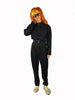 Black, wool, zip-up, long-sleeve jumpsuit with belt-loops and pockets.  