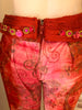 Red, tie-dye, velvet, bejewelled, two-piece set. Consists of bell-bottom pants and halter bra-top. 