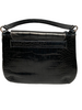 Black, leather, faux-crocodile patterned bag with strap. 