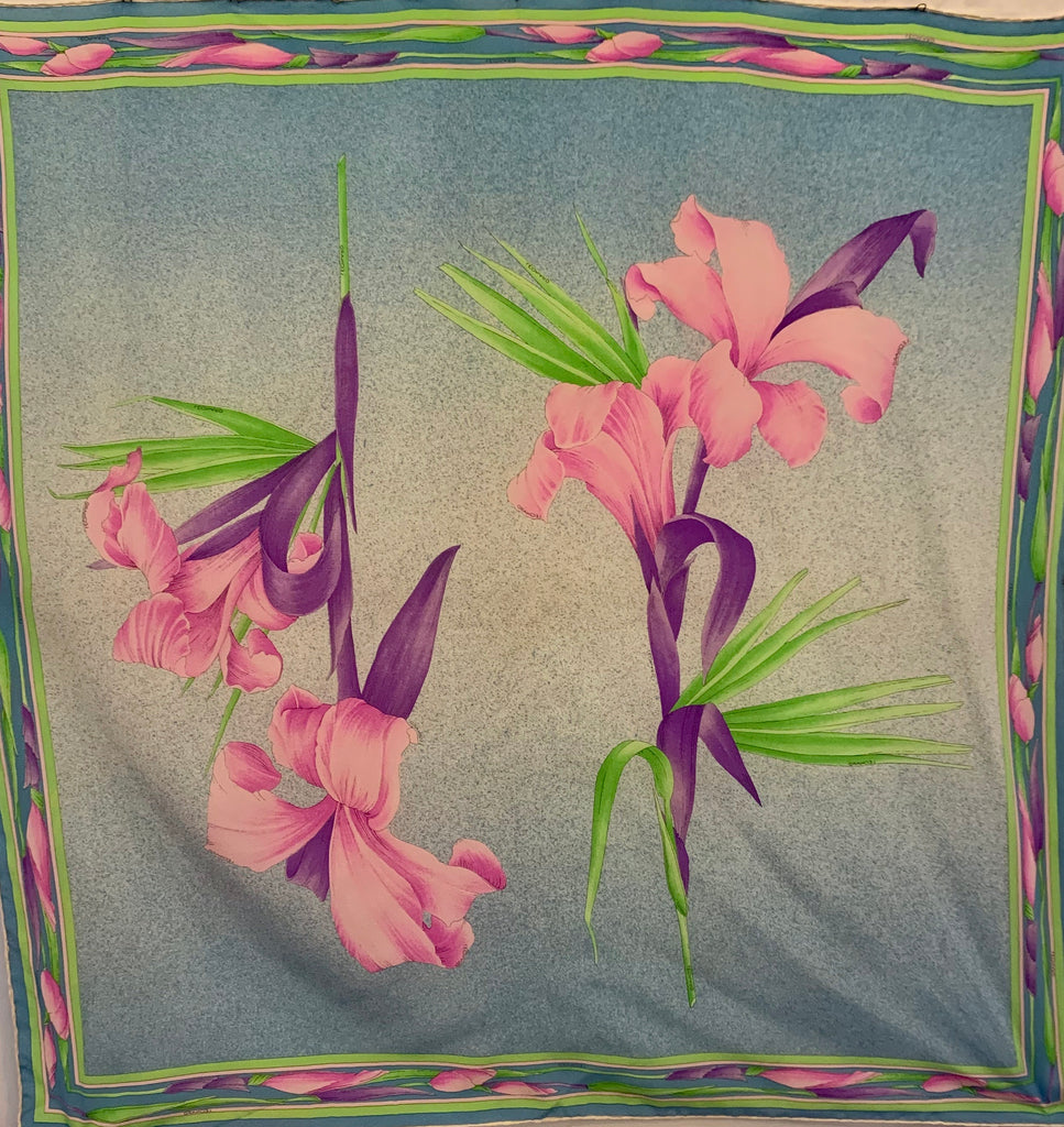 Square silk scarf with floral pattern in blue, pink, purple and green