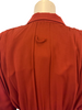Rust color, ruched dress with loop at back of neck. 