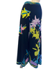 Black, high-waisted, wide-leg pants with a lime green, purple, aqua, and pink flower print. 