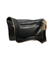 Black, leather bag with long strap, gold piping, and a gold tassel. 