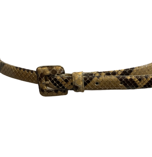  A skinny waist belt by Nancy Gonzales featuring a genuine python band and a python covered square buckle.