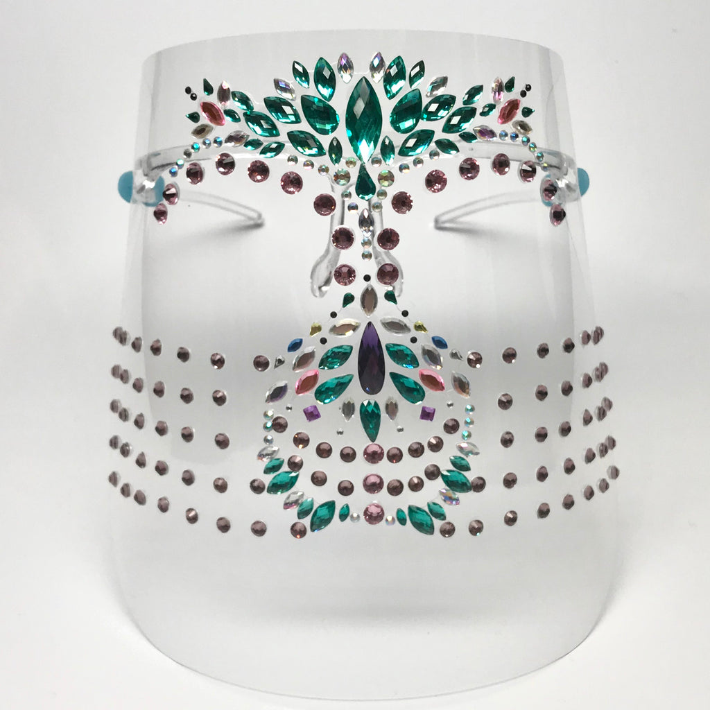 Clear plastic face shield with multicolored rhinestones and light pink crystals  Clear plastic arms rest on the ears.
