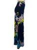 Black, high-waisted, wide-leg pants with a lime green, purple, aqua, and pink flower print. 