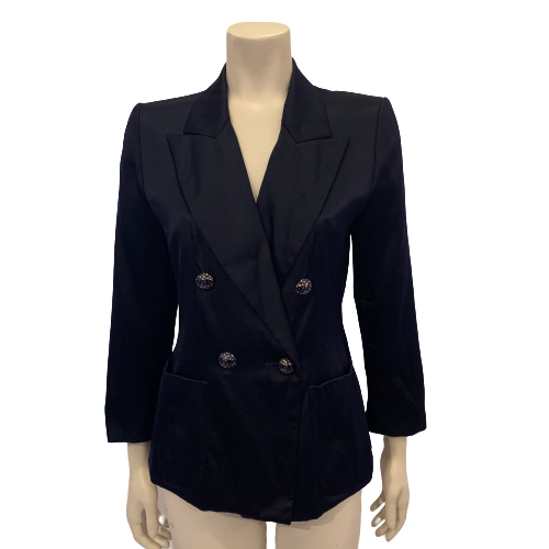 Navy blue silk blazer with notched collar and four metal buttons in blue with gold polka dots.