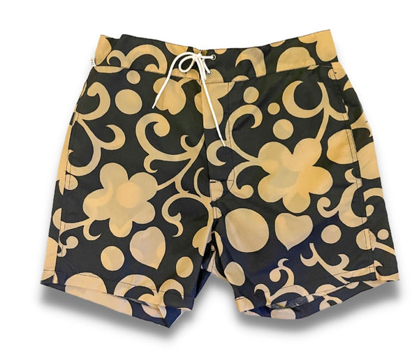 black and beige floral swim shorts
