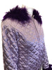 Lilac, quilted jacket with hood and purple, faux-fur trim. Rhinestone embellishments and belt. 