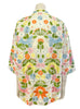 White and multicolor floral embroidered jacket.