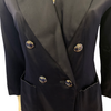 Navy blue silk blazer with notched collar and four metal buttons in blue with gold polka dots.