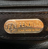 Engraved "Fendi" tag. 