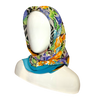 Gianni Versace Geometric & Floral Scarf-light backdrop colors orange,pink and blue with repeating geometric checker and Greek Meander pattern-forward view of scarf worn on head/neck