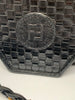 Fendi woven envelope bag in black leather with long braided shoulder strap . Fendi logo is embossed on the front.