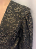 Black & silver, floral brocade, doublet jacket with lace-up, removable sleeves. 