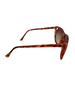 Amber tortoise color plastic sunglass with triangle cutout on sides and amber lenses