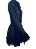 Sheer, long-sleeve, silk dress with bow at neck, and ruffles at wrist. Gathered waist. Length is above the knee.