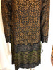 long-sleeve, tent-style, knee-length dress with a combination of lace & leopard-print jacquard in greens, brown and gold.