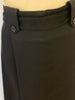 Black, wool, high-waisted midi-skirt with a paper-bag-waist and 1 side-pleat. 