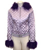 Lilac, quilted jacket with hood and purple, faux-fur trim. Rhinestone embellishments and belt. 