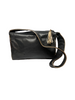 Black, leather bag with long strap, gold piping, and a gold tassel. 