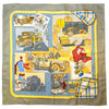 Grey, yellow, and blue scarf with automobile print. 