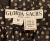 Gloria Sachs tag. 