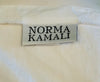 Norma Kamali tag. 