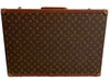 Large, hard, leather suitcase with an all-over “LV” monogram print. Brass hardware.