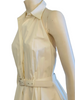 White, cotton, halter-neck, collared, belted sundress with full skirt. Above the knee length. 