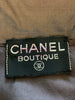 Chanel Boutique tag. 