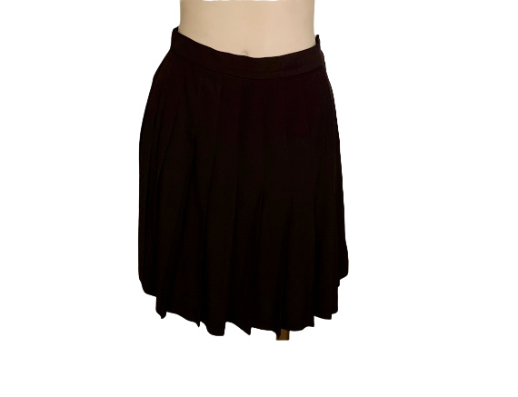 Black, mini-skirt with pleats that run on a diagonal.