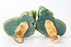 Close up back view of open earring backs with Dominique Aurientis signed stamp.