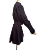 Navy cotton jacket with cropped front and back tails. Front fabric wraps across the body. High neck and cuffed sleeves.