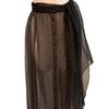 Black with white dots, sheer, maxi-skirt with a large sash at the waistband.