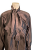 Iridescent copper silk blouse with long sleeves and a large bow at neck. Bottom of bow and cuff are trimmed accordion pleats. Button down front