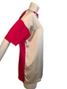 Side view of mannequin wearing pink and cr��me color block t-shirt revealing pink cotton back side