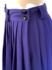 Cobalt blue, pleated, mini-skirt with belt-loops. Black side-buttons. 