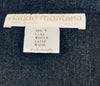 Close up of Claude Montana tag in grey knit shirt. 