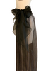 Black with white dots, sheer, maxi-skirt with a large sash at the waistband tied into a bow. 