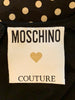 Close  up of authentic "Moschino Couture" label 